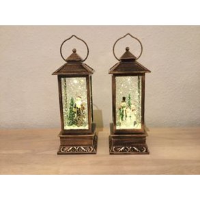 Lanterne med sne og musik