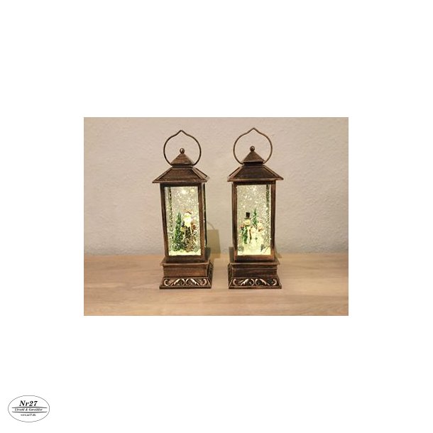 Lanterne med sne og musik